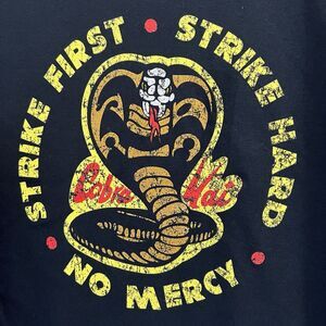 NWT Cobra Kai STRIKE FIRST STRIKE HARD NO MERCY (XL) Tshirt Karate Kid Netflix